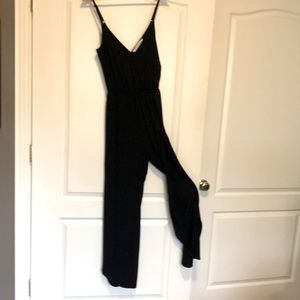 Cupcakes and Cashmere knit jumpsuit. Legs are open to waist. Wrap from back.